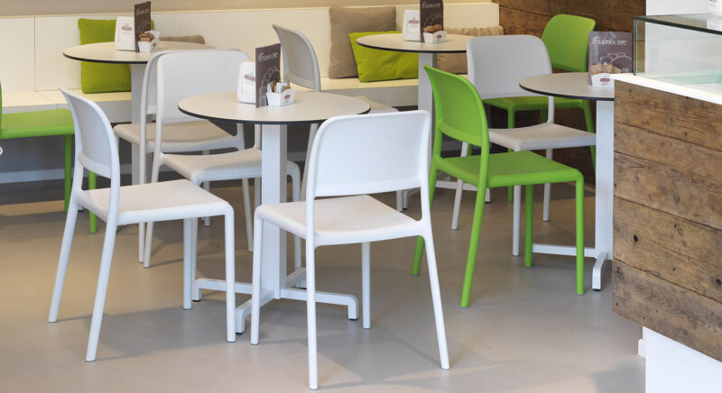 Fiore Table Base (White) in a Cafe Setting