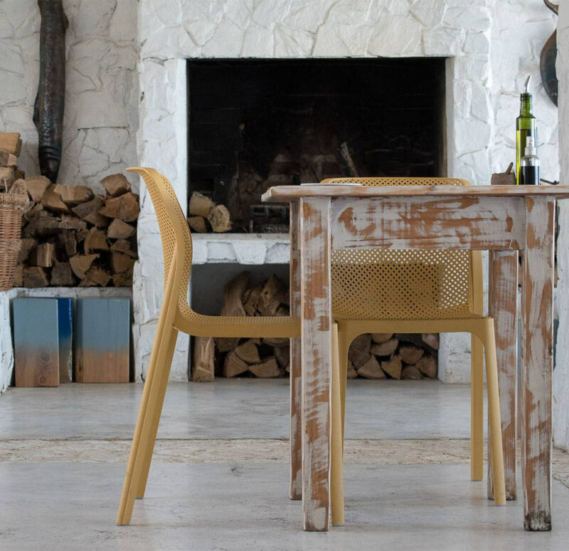 NARDI Bit Chairs in Mustard at rustic hall table