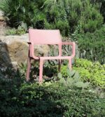 NARDI Trill Armchair (Rosa Pink) in garden with rocks and succulent plants