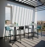 NARDI Trill Tall Bar Stools on Outdoor Balcony in Charcoal and Teal