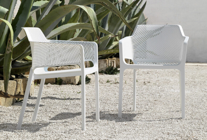 Net Chairs in White - Pictured on gravel patio area