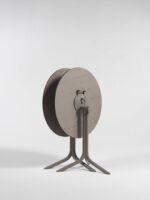 Horizotnally Stacked Flute Folding Table Bases in Taupe