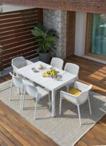 NARDI Rio Alu 140-210 Extendable Outdoor Dining Table with Net & Bit Chairs in White on Outdoor Deck