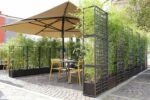 NARDI Sipario Eco Wall Planters in Outdoor Cafe Area
