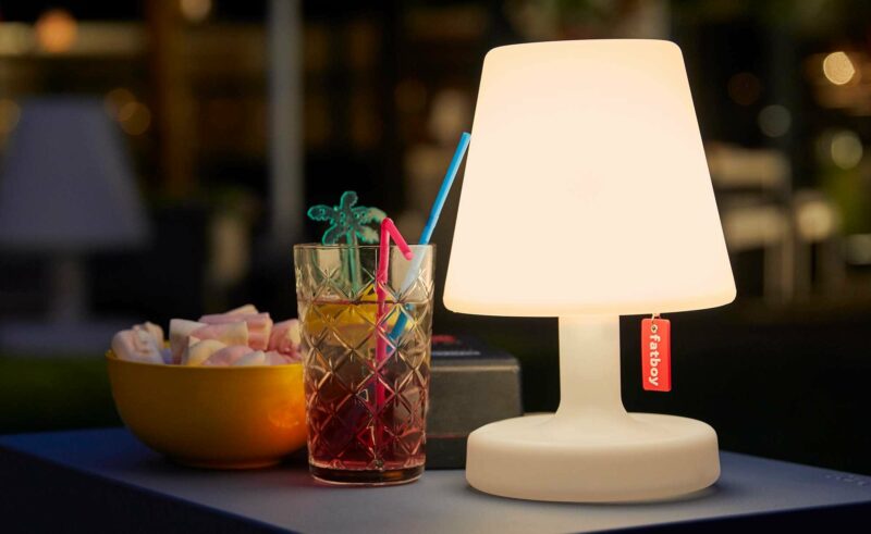 Fatboy® Edison the Petit Lamp on Outdoor Side Table at Night
