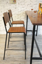 ByDezign Mid-Century Modern Retro School Tall Bar Stools in Tan at Bar leaner